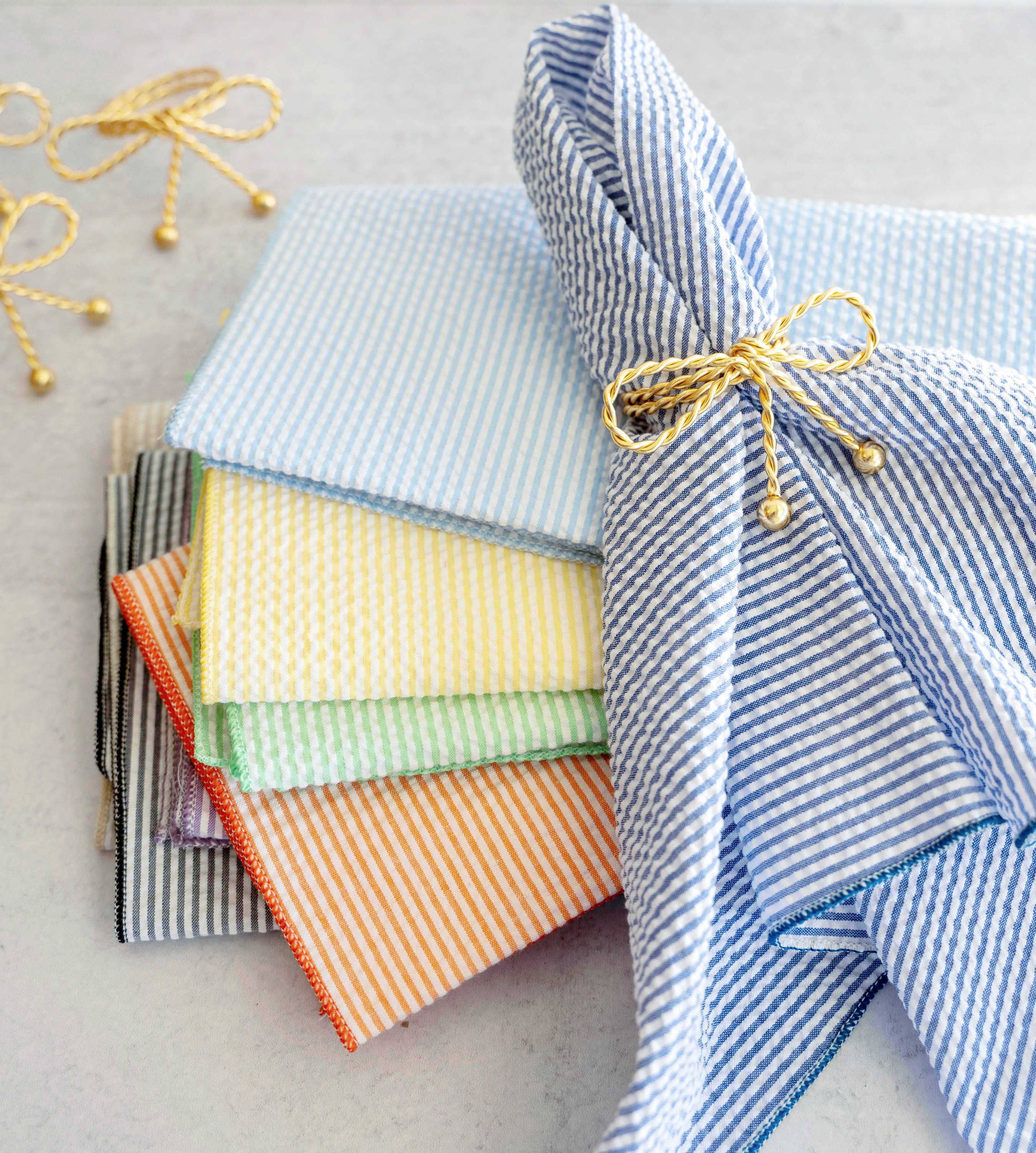 Tie A Bow Napkin Rings, set of four- Gold and Silver